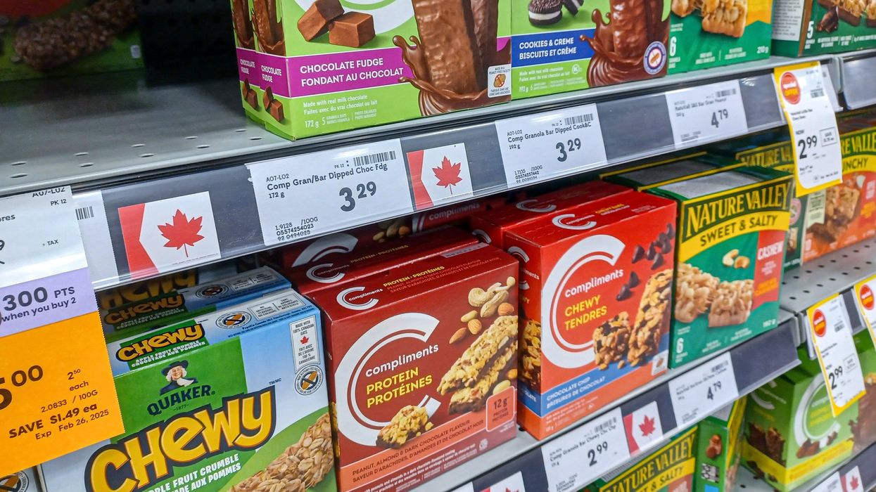 grocery store in canada with canadian flag labels on product shelves