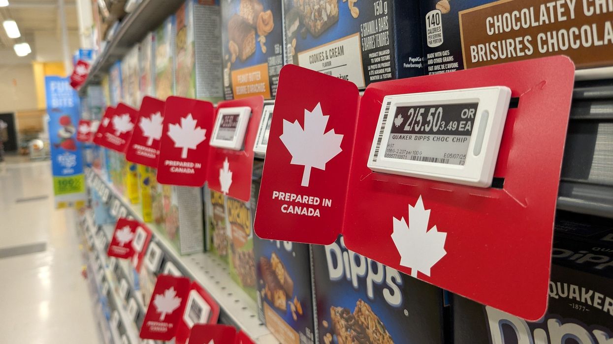 grocery store shelf with prepared in canada labels on products
