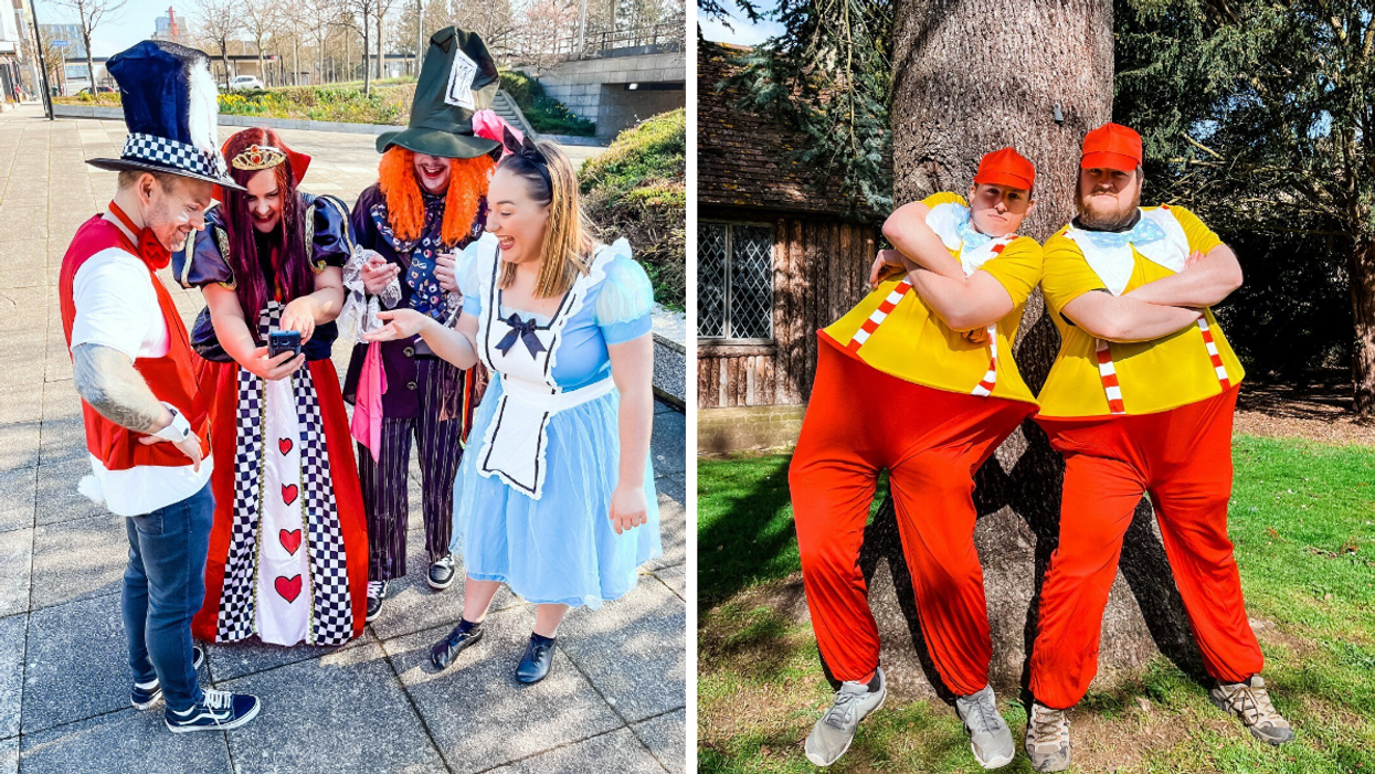 Group of friends playing an 'Alice in Wonderland' themed escape room game in costumes.