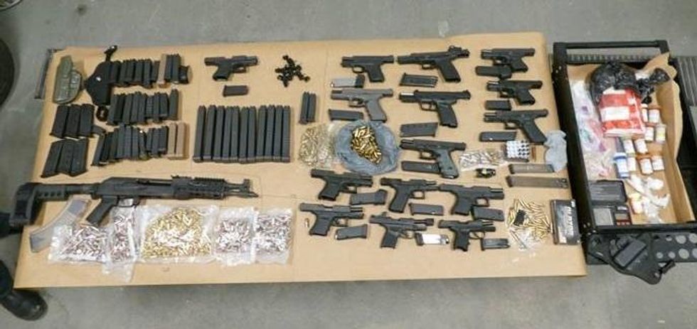 Guns and drugs seized as part of Project Touchdown.