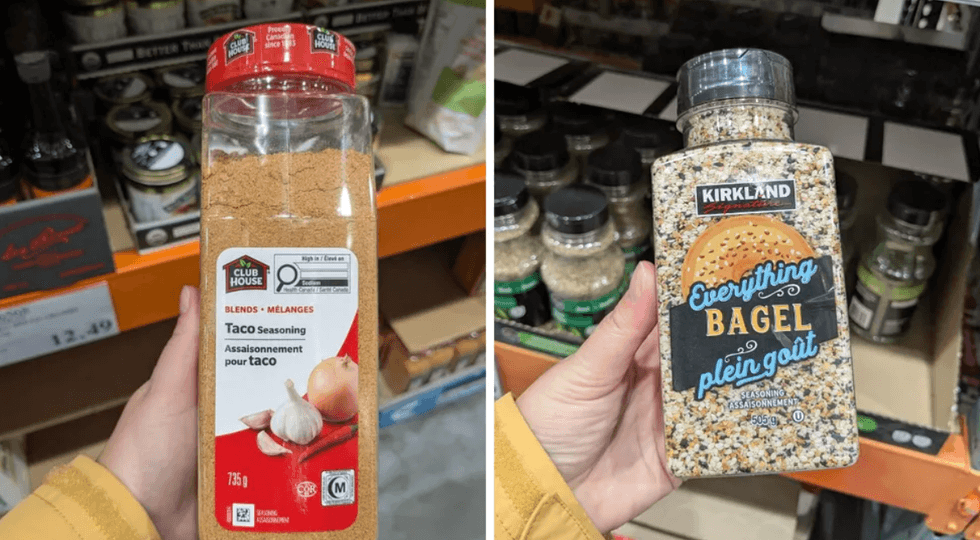 Hands holding taco seasoning and everything bagel seasoning bottles in a store.