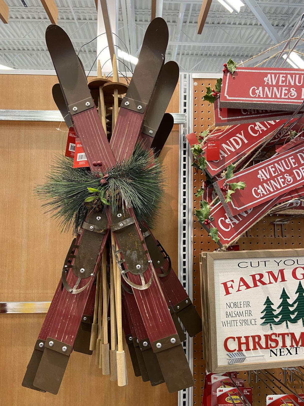 Hanging wooden skis holiday door decoration.