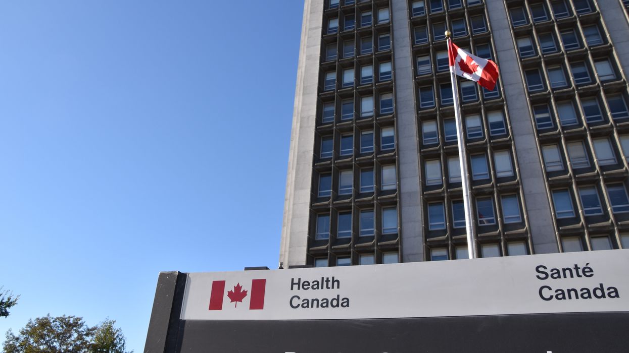 health canada office building with sign and canadian flag