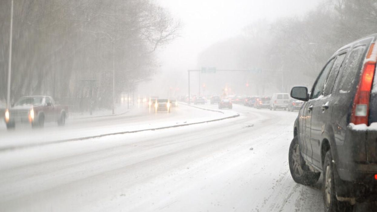Highway during a snowstorm.