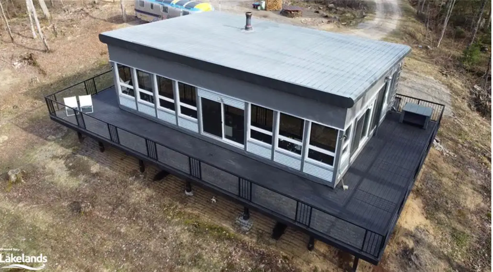 Home with wrap-around deck.