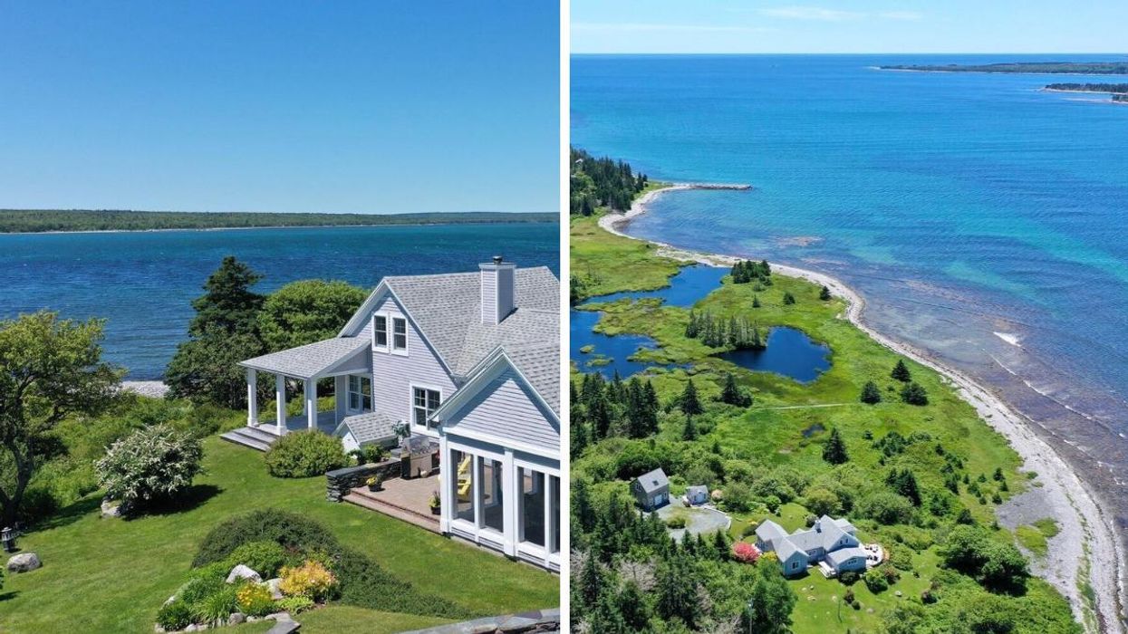 House for sale in Nova Scotia with a spacious backyard and a white sand beach on the ocean.