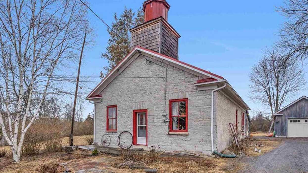 This $435K Schoolhouse In Ontario Looks So Different Inside & Still Has The Original Bell