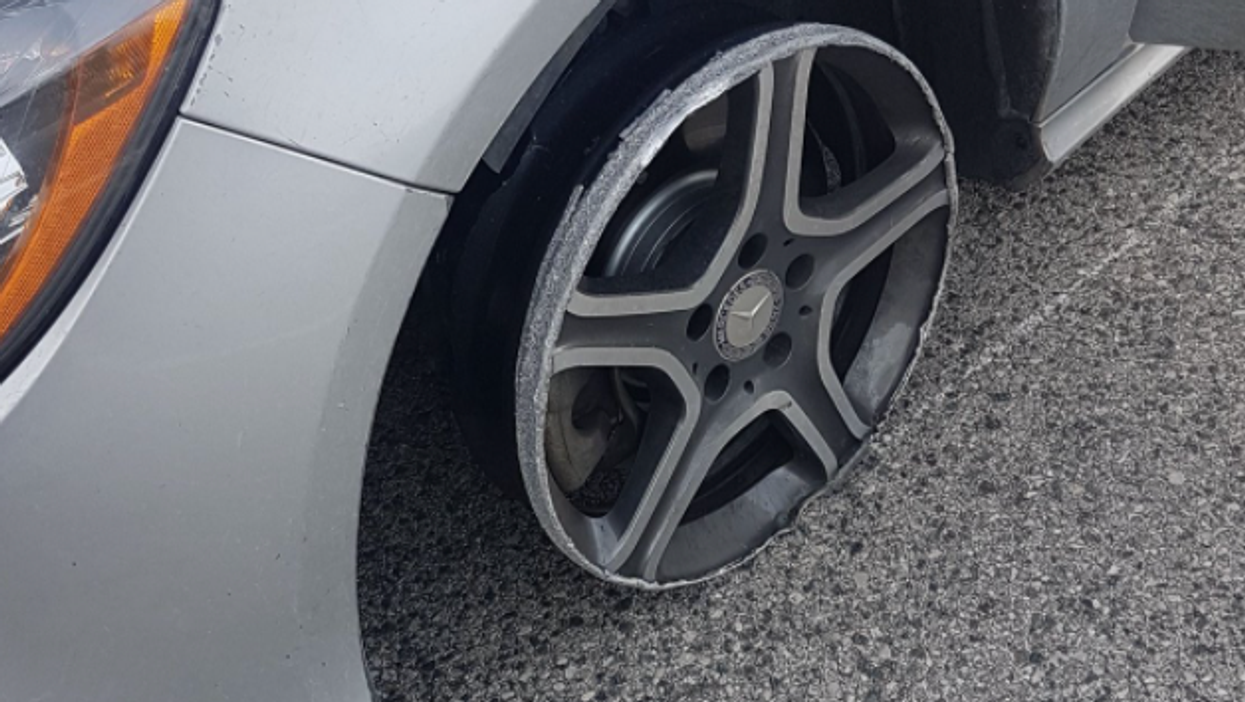Drunk Driver Caught Flying Down The 401 With A Tire Missing (PHOTOS)