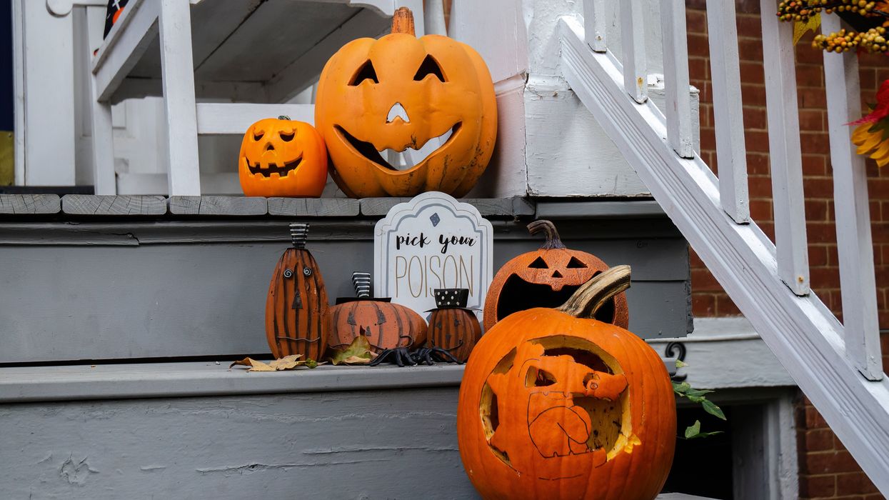 Jack-o'-lanterns on a porch.