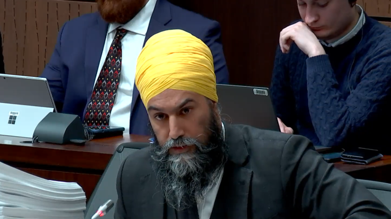 Jagmeet Singh at a government meeting on March 8, 2023, wearing a turban that a columnist tweeted about.