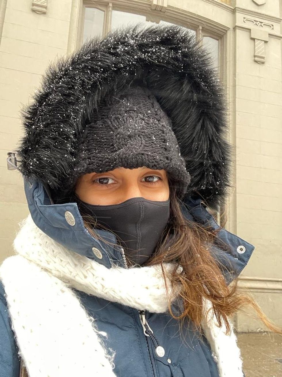Janice Rodrigues bundled up against the cold.