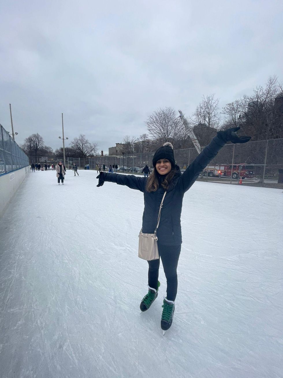 Janice Rodrigues discovering outdoor ice skating.