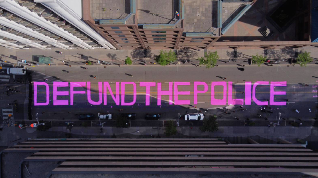 Juneteenth Protestors In Toronto Are Painting 'Defund The Police' On City Streets (VIDEO)