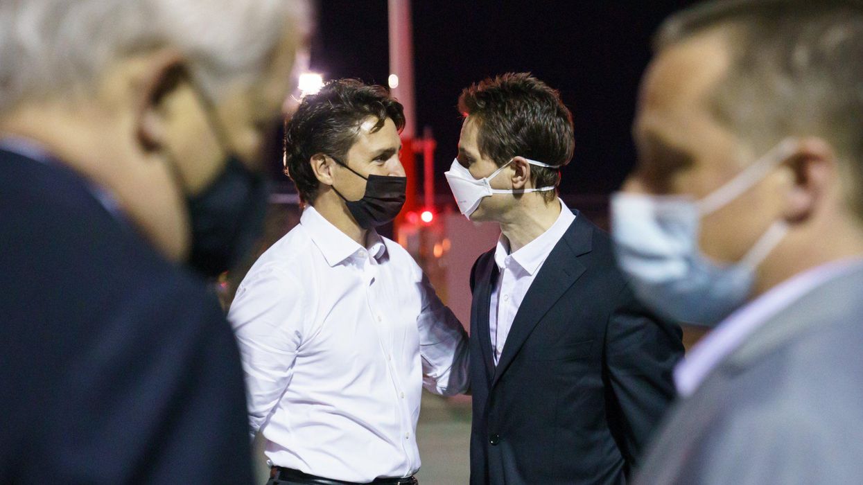 Justin Trudeau Welcomed The Two Michaels Back To Canada With Hugs At The Calgary Airport