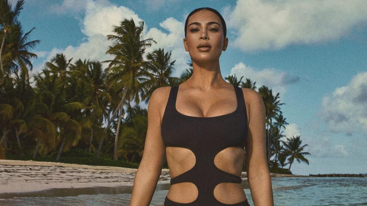 KIm Kardashian wearing SKIMS Swim.