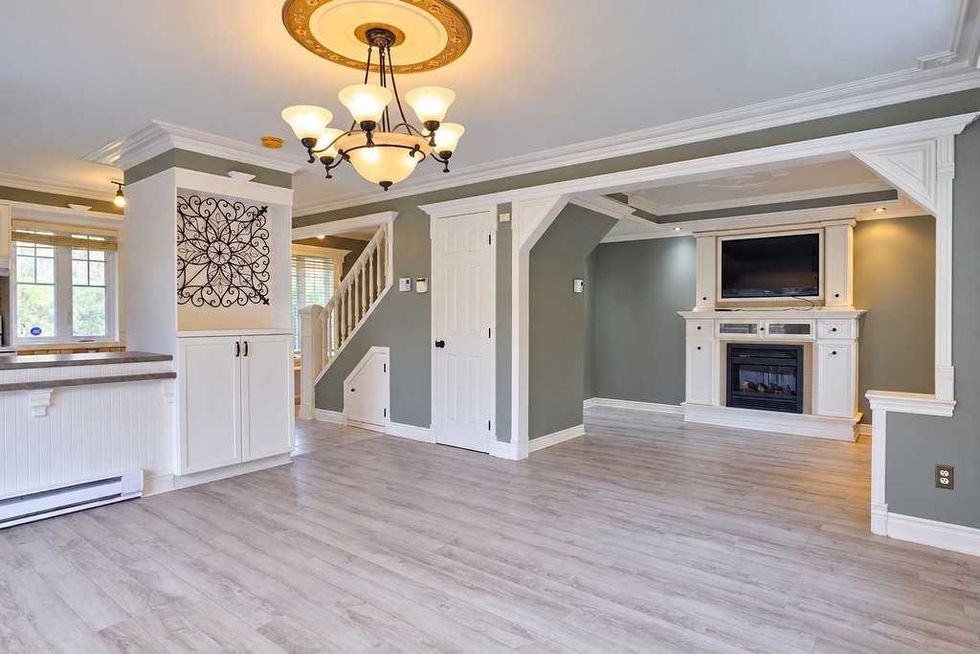 L\u2019aire ouverte de la maison \u00e0 vendre dans les Laurentides.