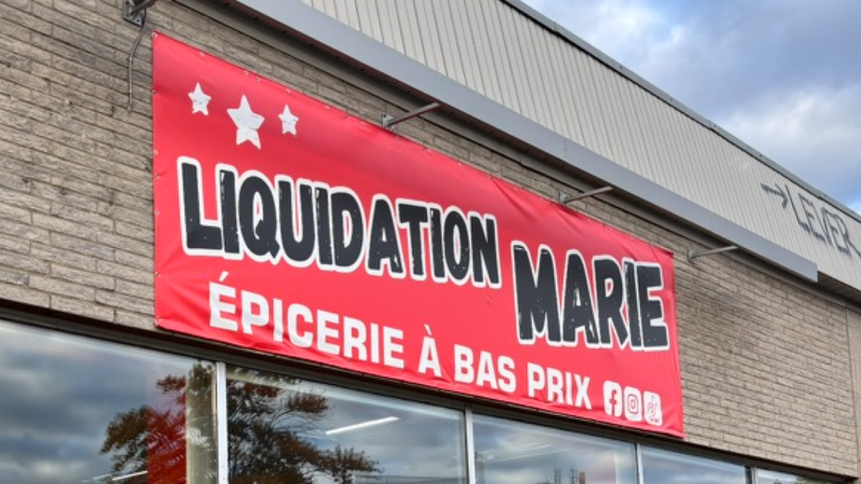 La façade d'une épicerie Liquidation Marie.