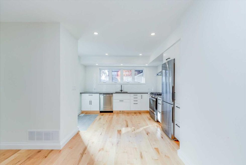 Laneway House In Toronto Is A Spacious & Sunny Gem Hidden Away In A Greektown Backyard