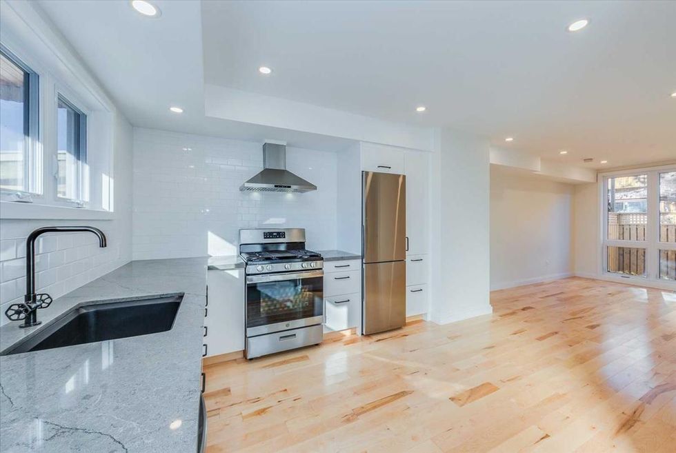 Laneway House In Toronto Is A Spacious & Sunny Gem Hidden Away In A Greektown Backyard