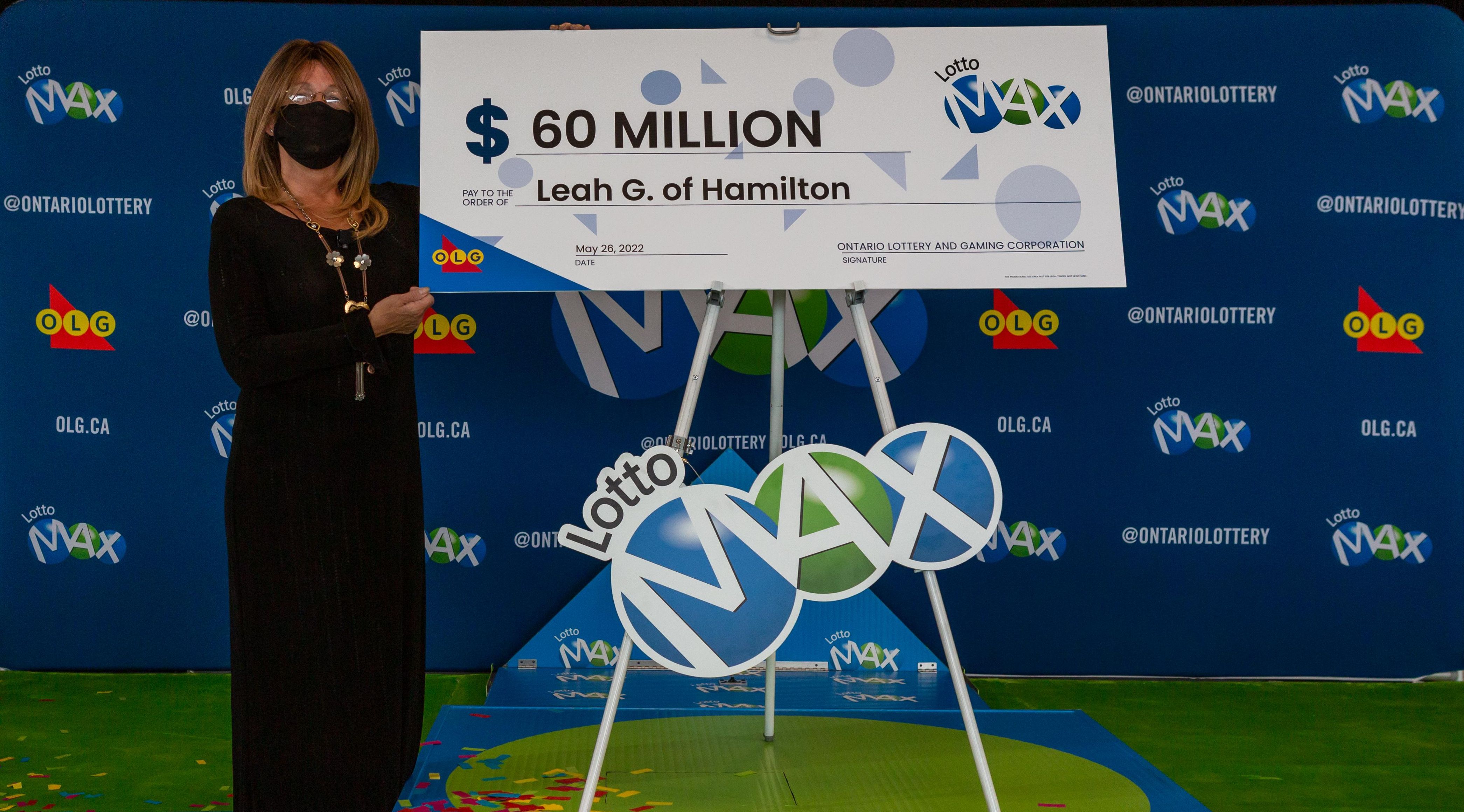 Leah Murdoch-Gerics from Hamilton collecting her cheque.