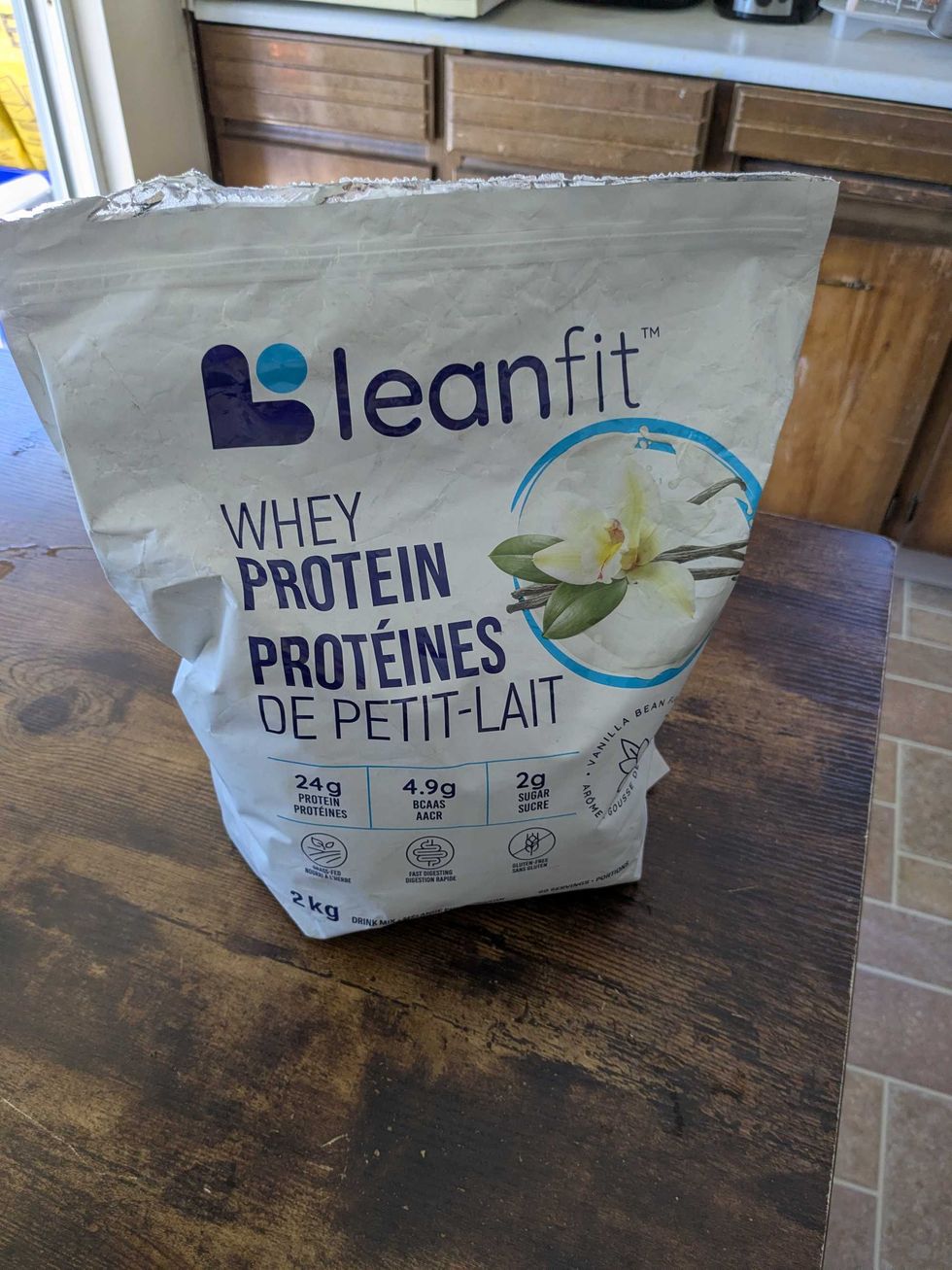 Leanfit Whey protein bag on a counter