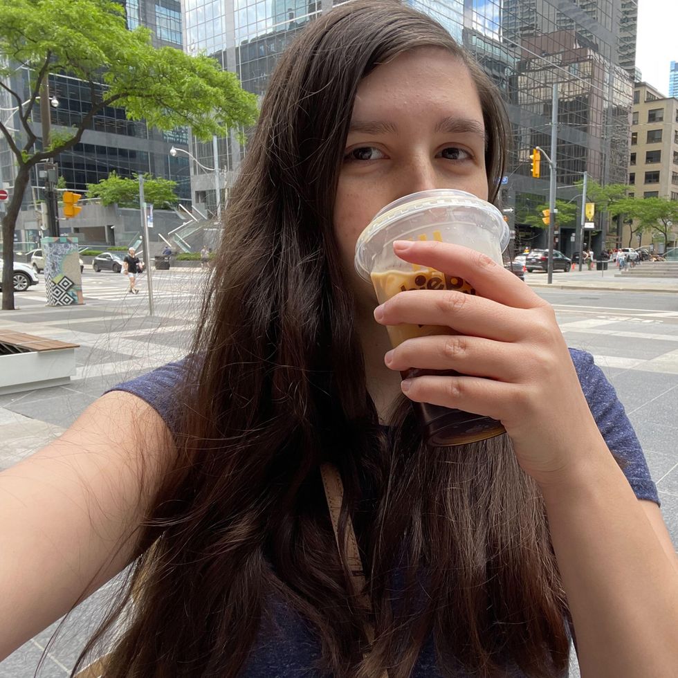 Lisa Belmonte drinking Biebs Brew.