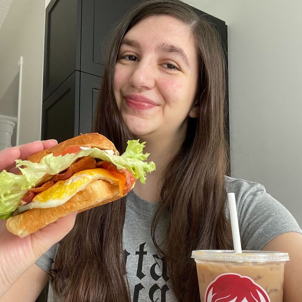 Lisa Belmonte with the Wendy's Egg BLT and Iced Coffee.