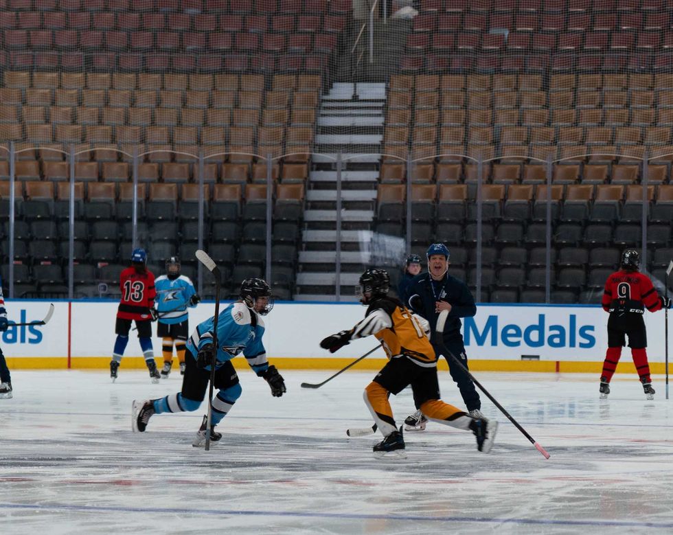 Little NHL players on the Maple Leafs' home ice.
