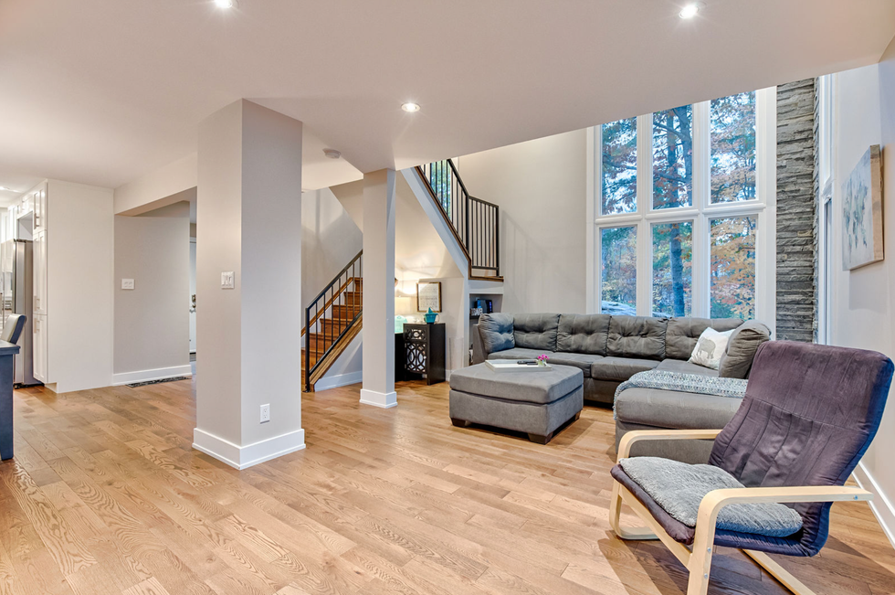 Living area with large windows.