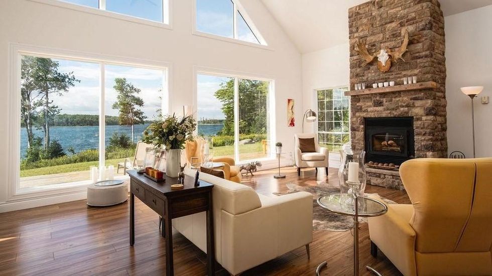 Living room with views of the water from the huge windows.