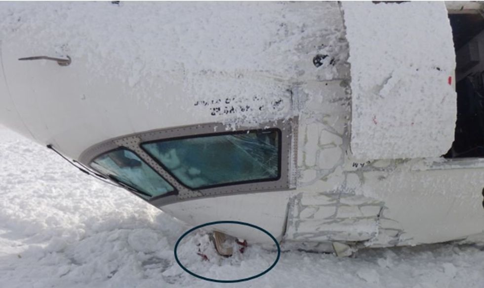 Location of escape hatch through which the pilots egressed.