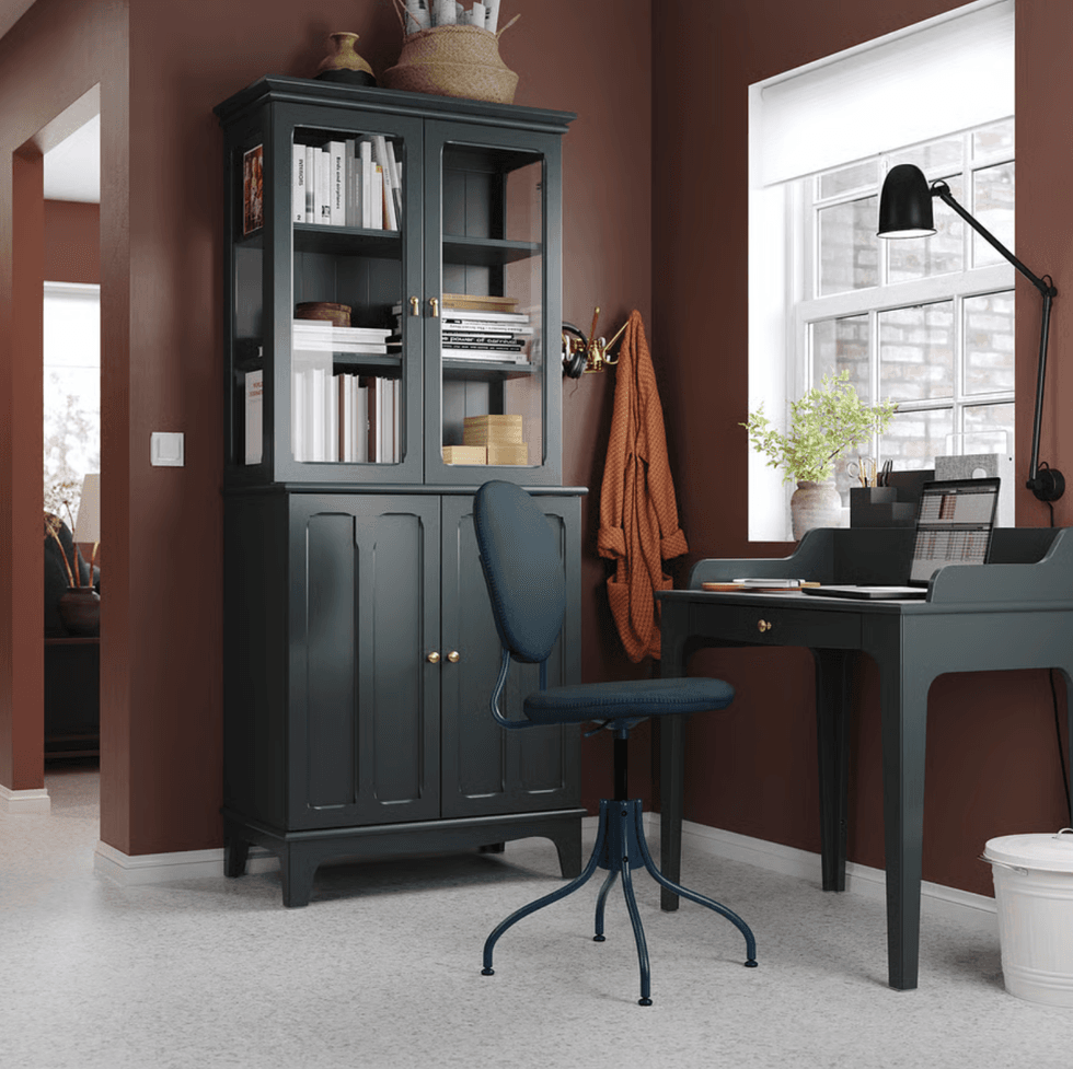 LOMMARP cabinet with glass doors in a cozy home office setup.