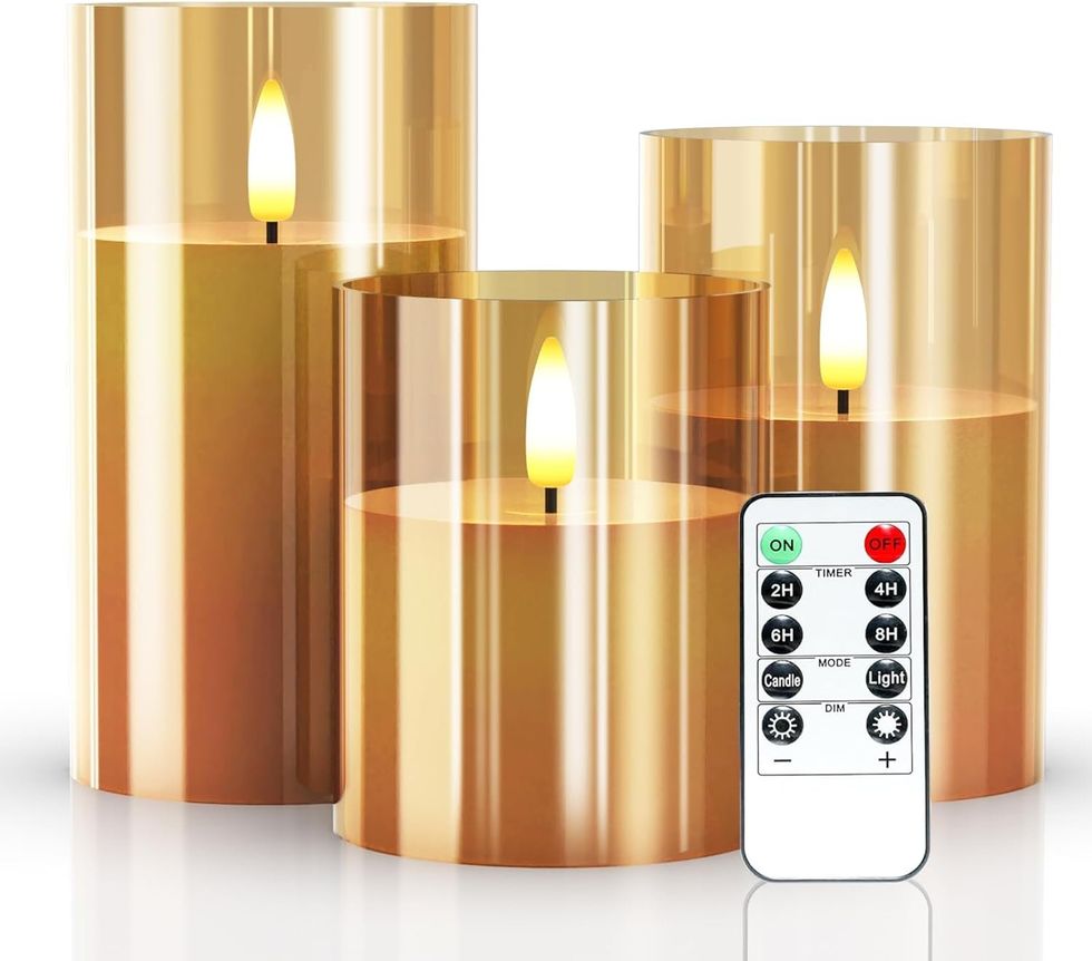 Lot de trois bougies sans flamme en verre acrylique ambr\u00e9, avec une t\u00e9l\u00e9commande.