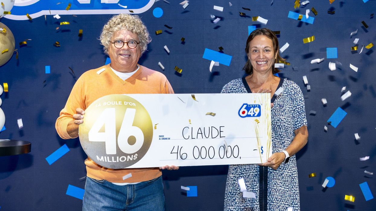 lotot 6/49 winner claude boucher holding $46 million cheque