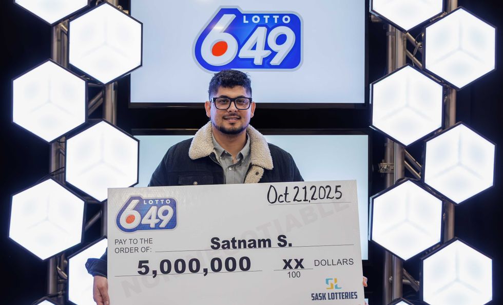 lotto 6/49 winner satnam singh with cheque