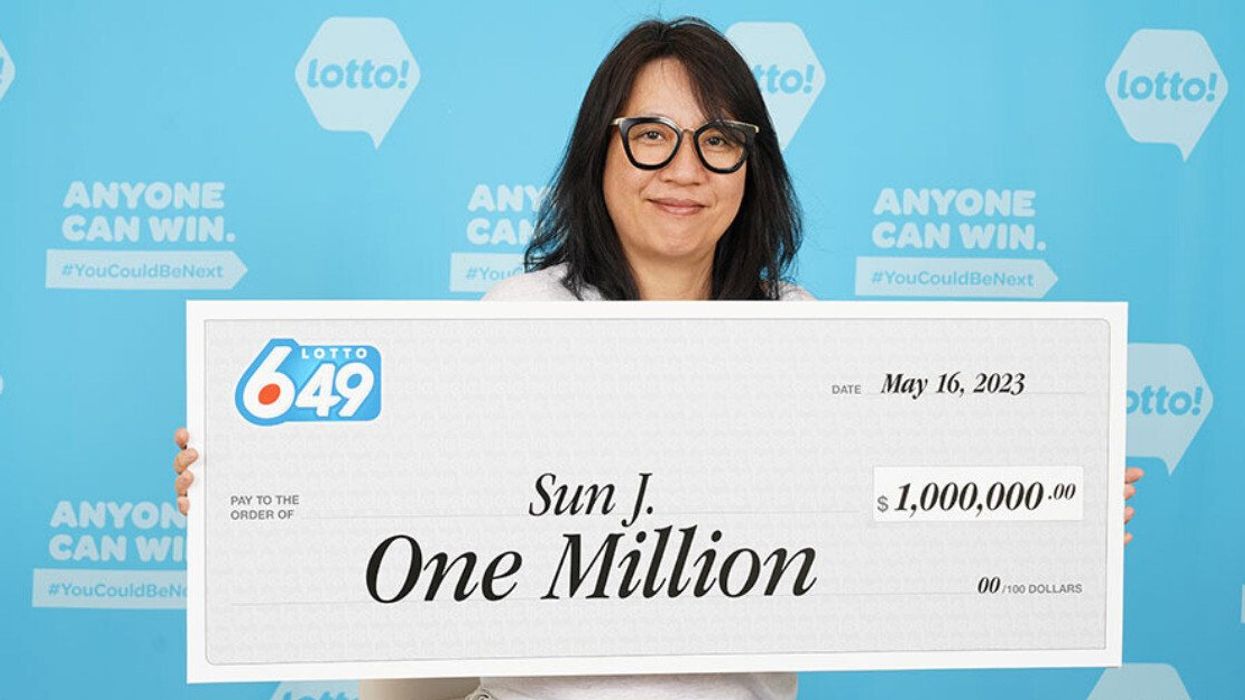 Lotto 6/49 winner Sun Jie.
