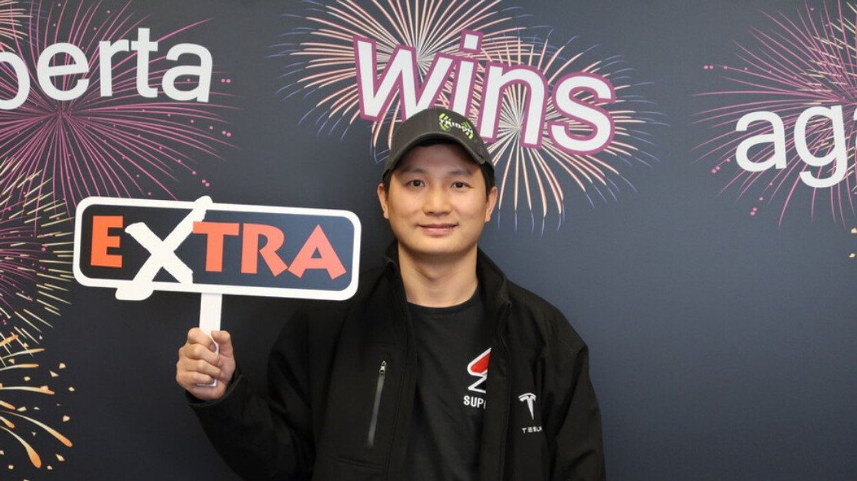 Lotto 6/49 winner Yi Jie Wang. 