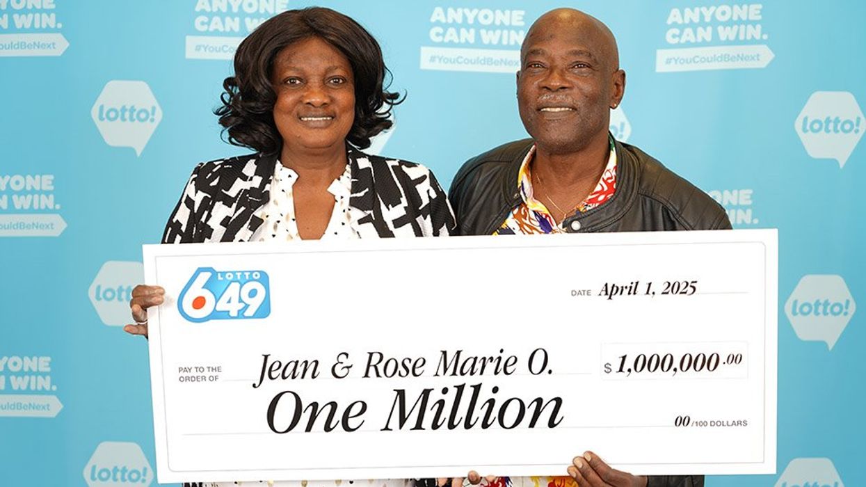 lotto 6/49 winners rose-marie orestil-casseus and jean orestil with $1 million cheque