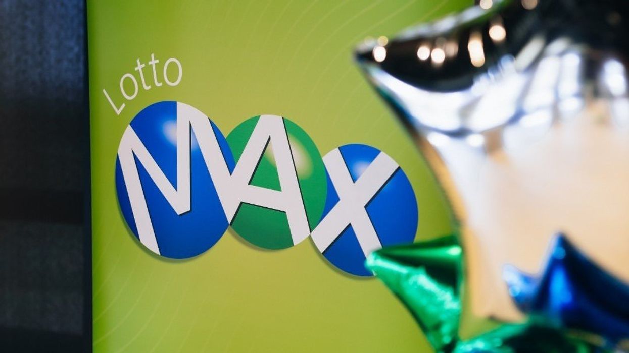 Lotto Max sign and balloons.