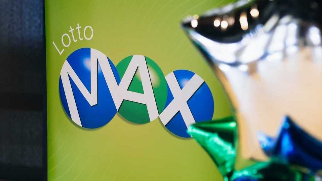 lotto max sign beside balloons