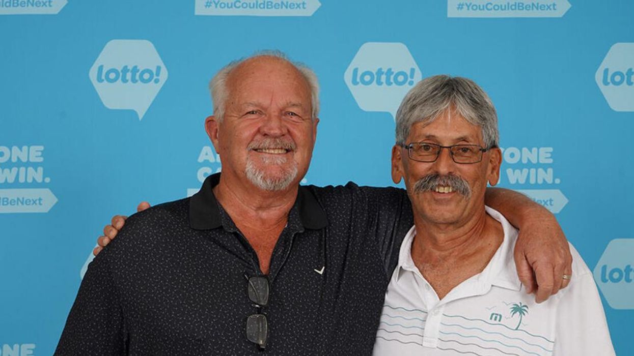 Lotto winner James Walsh and Douglas Snitchuk.