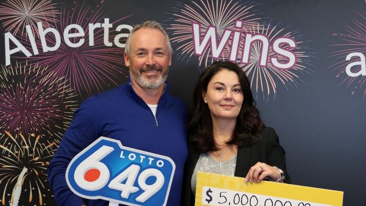 Lotto winner, Jolee Armstrong and her husband.