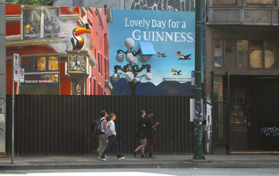 "Lovely Day for a Guinness" mural in Vancouver's Gastown.