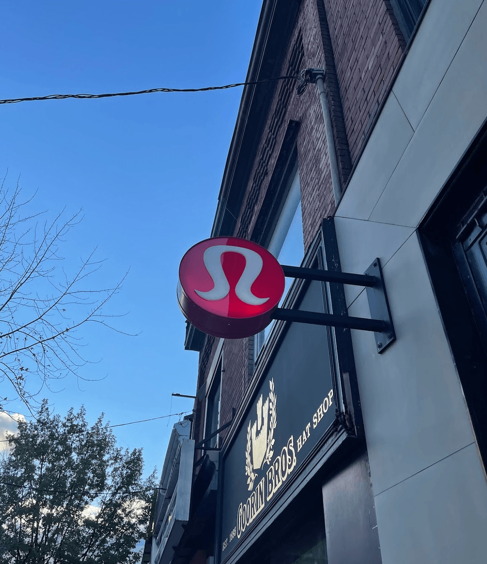 Lululemon logo on a street.