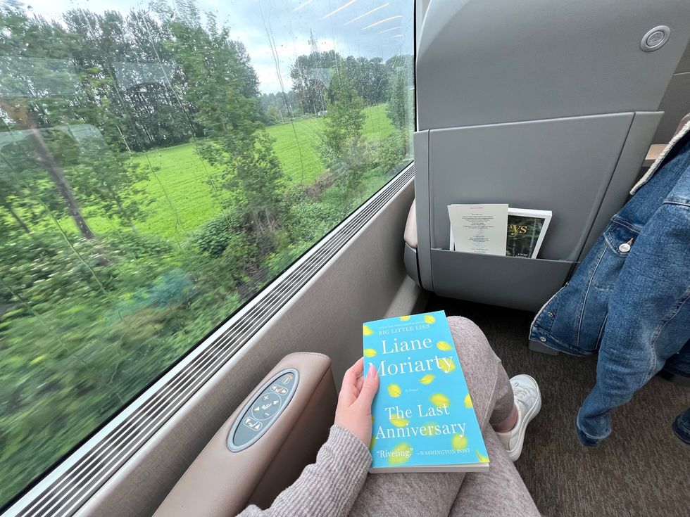 Madeline holding a book.