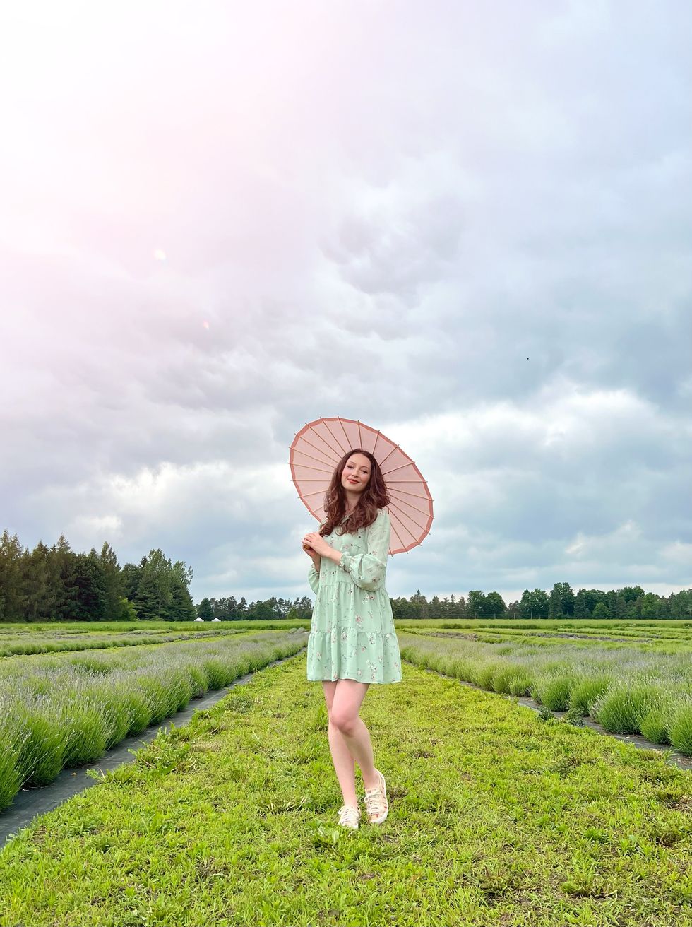 Madeline in a lavender field.