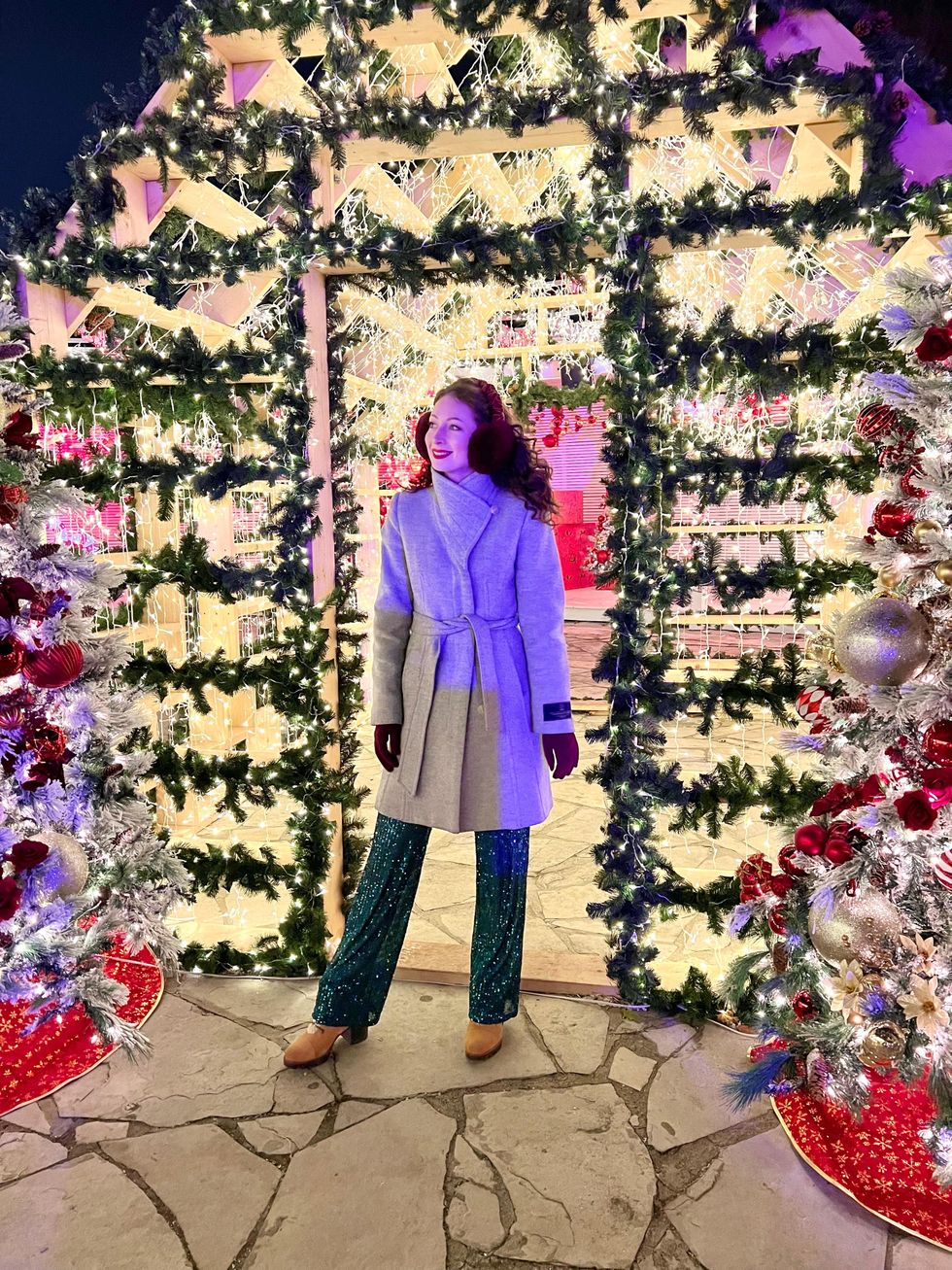 Madeline in front of Holiday House.