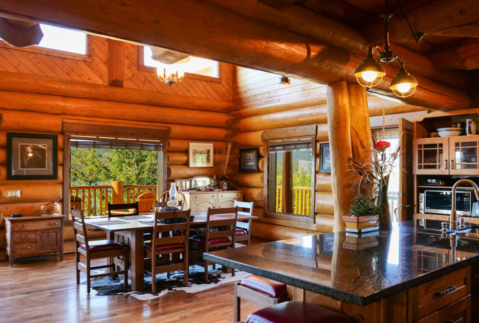 This Rustic Log Cabin Is For Sale In BC & It's Right Alongside A