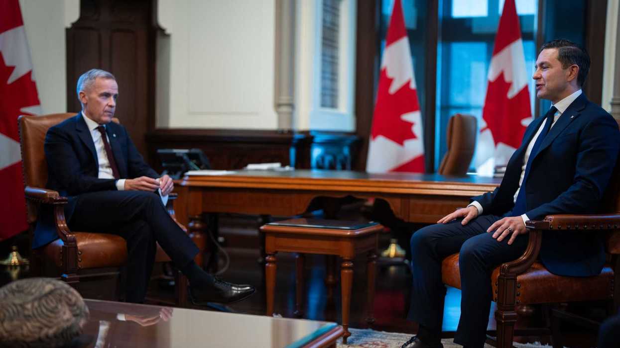Mark Carney and Pierre Poilievre sit across from each other in the PM's office.