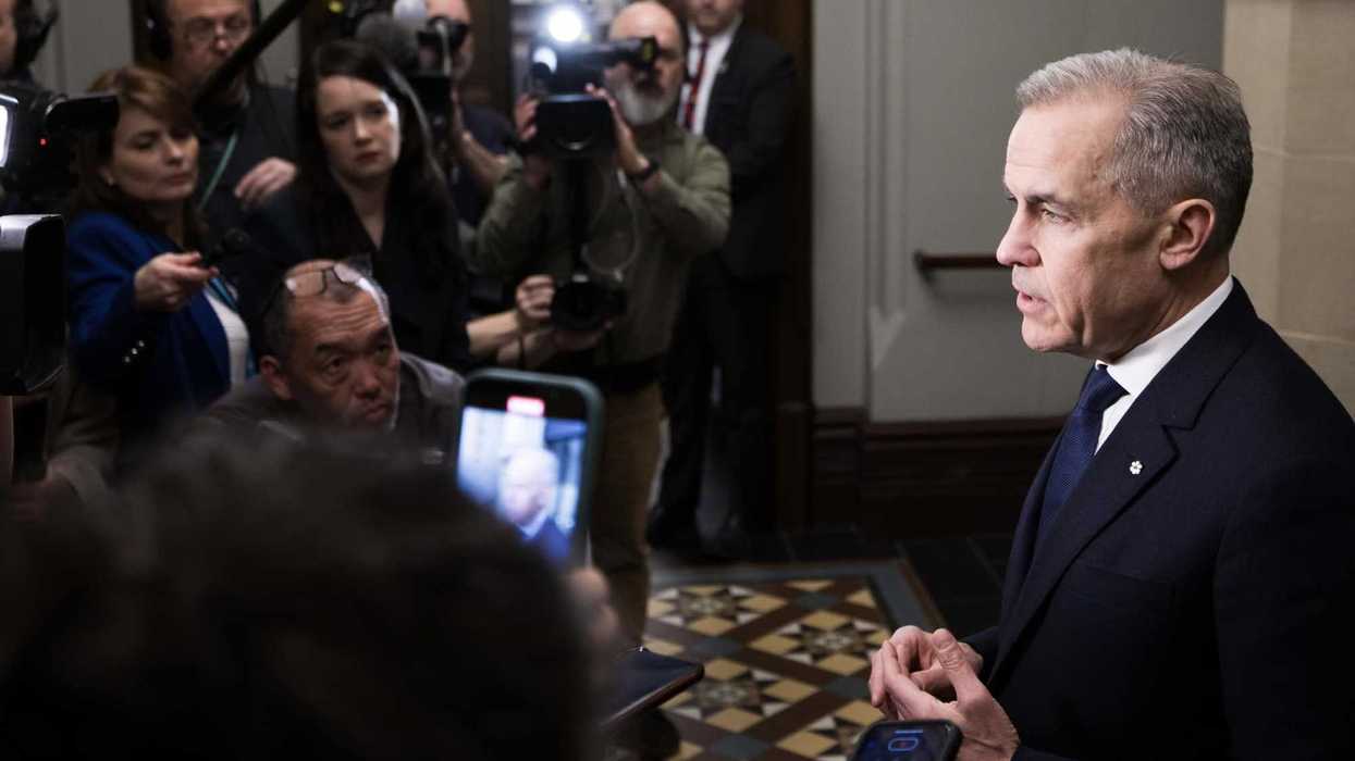 Mark Carney speaks to reporters on Parliament Hill.